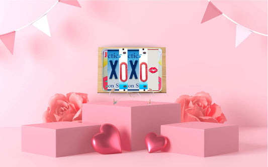 Celebrate Love Sustainably with Our XOXO💋 6 inch by 10 inch Recycled License Plate Letter Sign